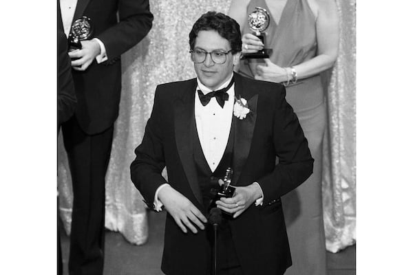 FILE - Harvey Fierstein, the star and author of the play "Torch Song Trilogy," accepts his Tony award in New York on June 5, 1983. (AP Photo/Richard Drew, File)