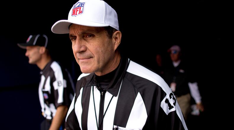 NFL referee Pete Morelli walks out of the tunnel before a game.
