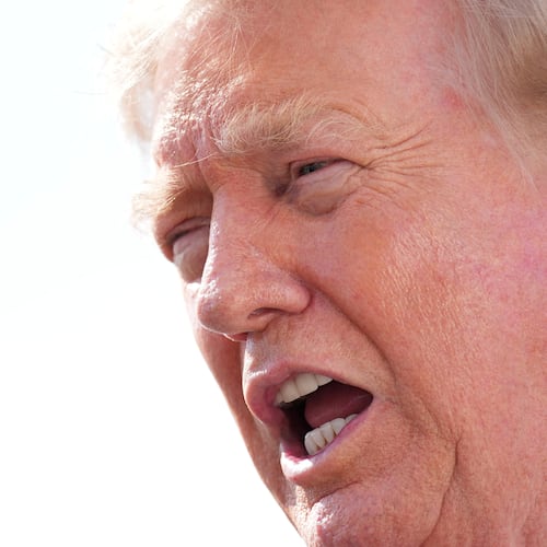 President Donald Trump speaks with reporters before boarding Air Force One, Friday, Aug. 21, 2026, at Joint Base Andrews, Md., en route to South Carolina. (AP Photo/Jacquelyn Martin)