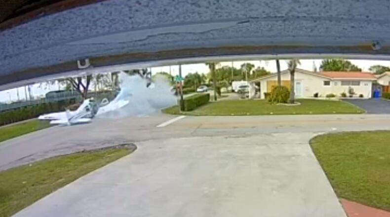 Three people have died after a small plane crashed in a Pembroke Pines, Florida, neighborhood on Monday afternoon, hitting a car as it went down, officials said.