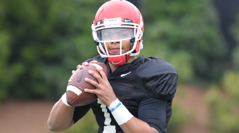 Georgia freshman quarterback Justin Fields throws during spring drills. (Photo by Steven Colquitt / UGA Athletic Department)