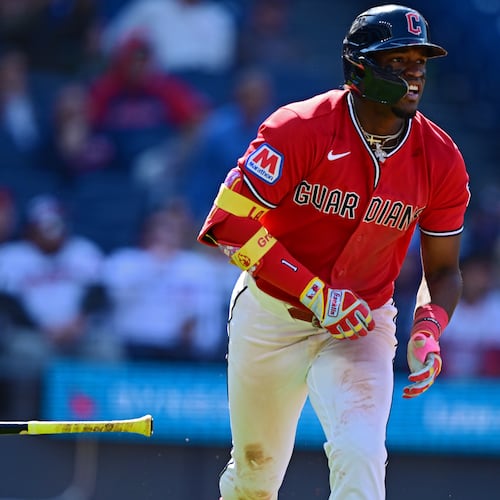 Cleveland Guardians' Angel Martinez watches his ball while running the bases after hitting a grand slam off Kansas City Royals relief pitcher Steven Cruz during the eighth inning of a baseball game, Wednesday, April 8, 2026, in Cleveland. (AP Photo/David Dermer)