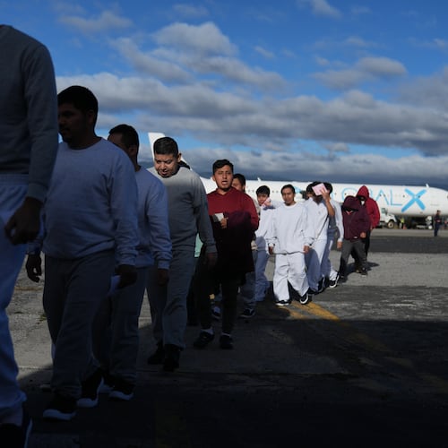 FILE - Guatemalans deported from the U.S. arrive at La Aurora airport in Guatemala City, Dec. 30, 2025, after deplaning a repatriation flight. (AP Photo/Moises Castillo, File)