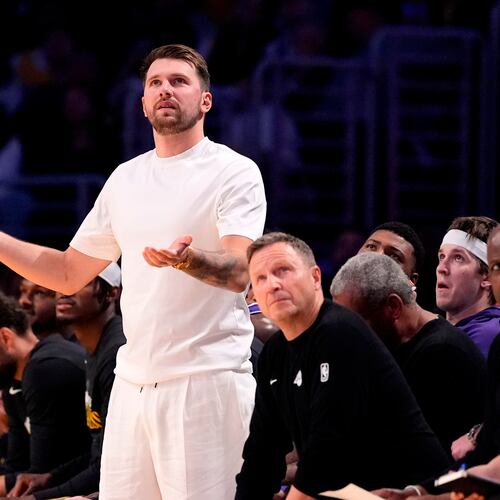 Los Angeles Lakers' Luka Doncic reacts from the bench after the Lakers were called for a foul during the second half in Game 5 of a first-round NBA playoffs basketball series against the Houston Rockets, Wednesday, April 29, 2026, in Los Angeles. (AP Photo/Mark J. Terrill)