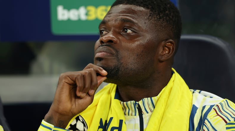 FILE - Villarreal's Thomas Partey sits on the bench during the Champions League soccer match between Tottenham and Villarreal in London, Tuesday, Sept. 16, 2025. (AP Photo/Ian Walton, File)