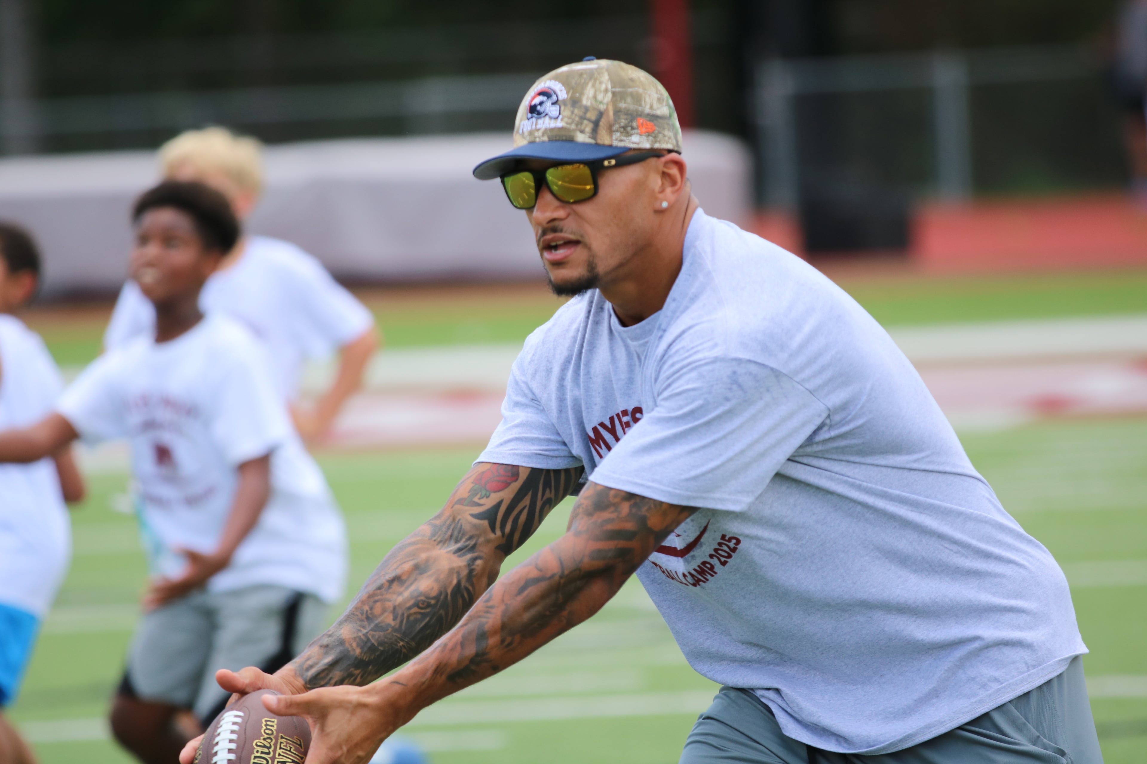 Former Hillgrove High star Evan Engram works at a skills camp at his alma mater on July 13, 2025. Engram is a two-time Pro Bowl tight end entering his ninth season in the NFL. He plays for the Denver Broncos. (Warren J. Buchanan Sr./Hillgrove)