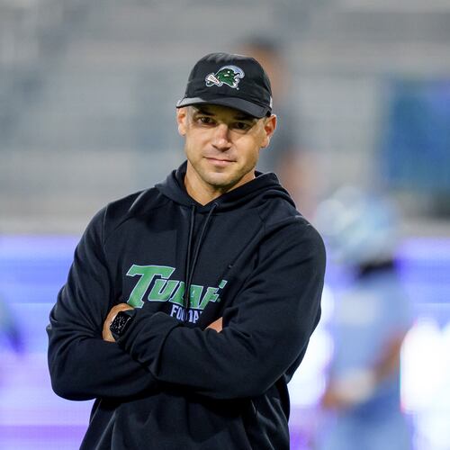 Tulane head coach Jon Sumrall watches his players before an NCAA college football game against Charlotte in New Orleans, Saturday, Nov. 29, 2025. (AP Photo/Matthew Hinton)