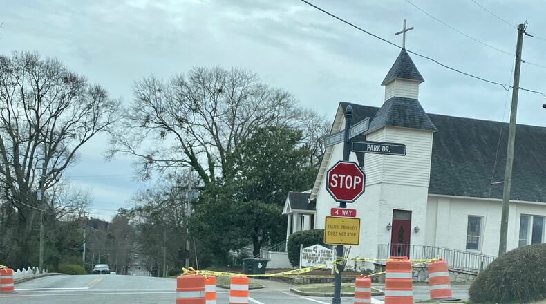 New stop signs have been installed at the intersection of Park Drive and N. Peachtree Street in Norcross to make it a 4-way stop. Motorists will need to begin stopping in all directions the week of Feb. 24. (Photo by Karen Huppertz)