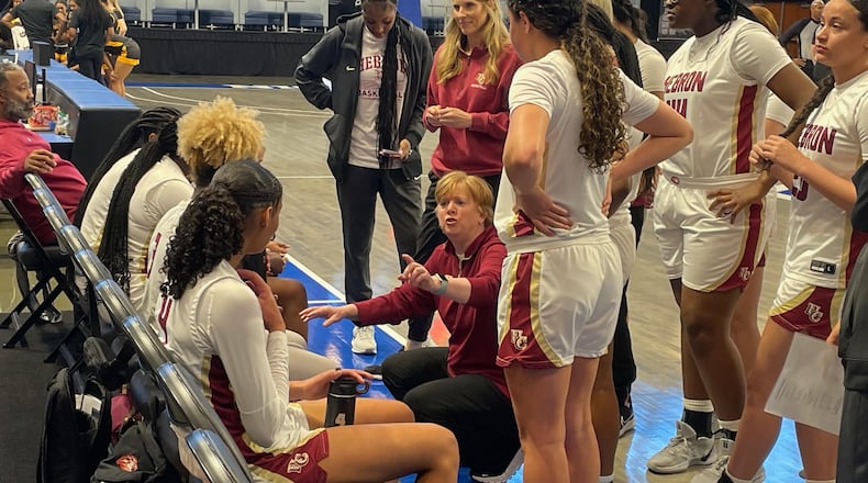 Hebron Christian coach Jan Azar talks to her team during a timeout in the Lions' 74-32 victory over Galloway in the Class 3A-A private girls basketball semifinals in Dahlonega on Feb. 28, 2025.