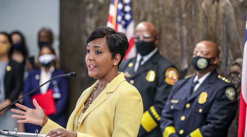 May 7, 2021 Atlanta:  Atlanta Mayor Keisha Lance-Bottoms held a press conference Friday, May 7, 2021 at Atlanta City Hall speaking about her decision not to run for a second term. In her first public appearance since announcing her decision to supporters Thursday night, Bottoms said her decision was guided by faith. “In the same way that it was very clear to me almost five years ago that I should run for mayor of Atlanta, it is abundantly clear to me today that it is time to pass the baton on to someone else,” Bottoms said at an emotional news conference at City Hall. She added that “the last three years have not been at all what I would have scripted for our city,” referencing a crippling cyber attack, a widening federal corruption investigation into the previous administration, the COVID-19 pandemic and civil unrest last year. Bottoms said she doesn’t know what’s next for her; she denied rumors that she or her husband Derek have taken jobs for Walgreens out of state. “I can’t get Derek to move two miles off Cascade Road,” she said. Bottoms, who was seen as a strong incumbent candidate despite a spike in violent crime, told friends and supporters Thursday evening she won’t seek a second term. She released a video and statement online a few hours later elaborating on her decision and reflecting on her time in office. “This is not something I woke up and decided yesterday,” Bottoms said Friday. “This is something I’ve been thinking about for a very long time.” (John Spink / John.Spink@ajc.com)