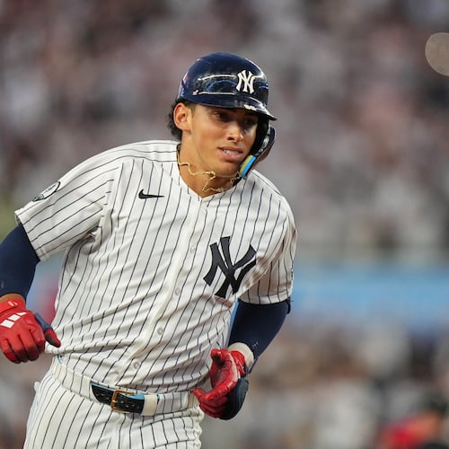 New York Yankees' George Lombard Jr. runs the bases after hitting a home run during the fifth inning of a baseball game against the St. Louis Cardinals Tuesday, Aug. 4, 2026, in New York. (AP Photo/Frank Franklin II)