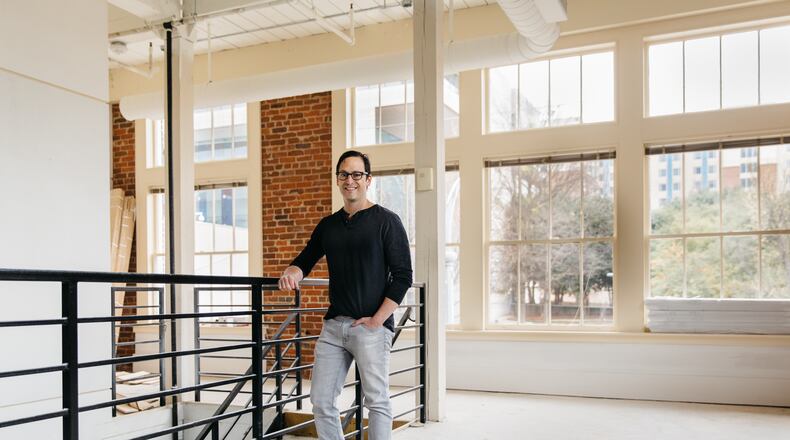 Developer Gene Kansas in Constellations, located on the second floor of 135 Auburn Ave.