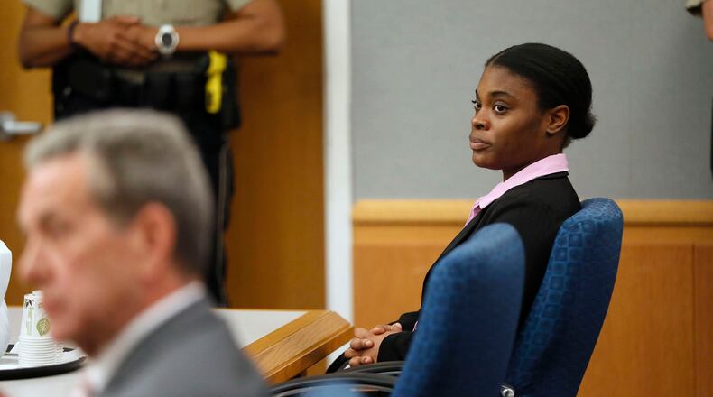 April 30, 2019 - Lawrenceville - Tiffany Moss watches as the jury is polled about the verdict. The jury in the Tiffany Moss murder trial today sentenced her to death after they found Moss, who is representing herself, guilty of intentionally starving her 10-year-old stepdaughter Emani to death in the fall of 2013, in addition to other charges. The prosecution is asking for the death penalty. Bob Andres / bandres@ajc.com