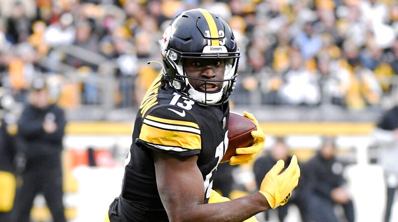 Pittsburgh Steelers wide receiver James Washington (13) plays against the Tennessee Titans during an NFL football game, Sunday, Dec. 19, 2021, in Pittsburgh. (AP Photo/Don Wright)