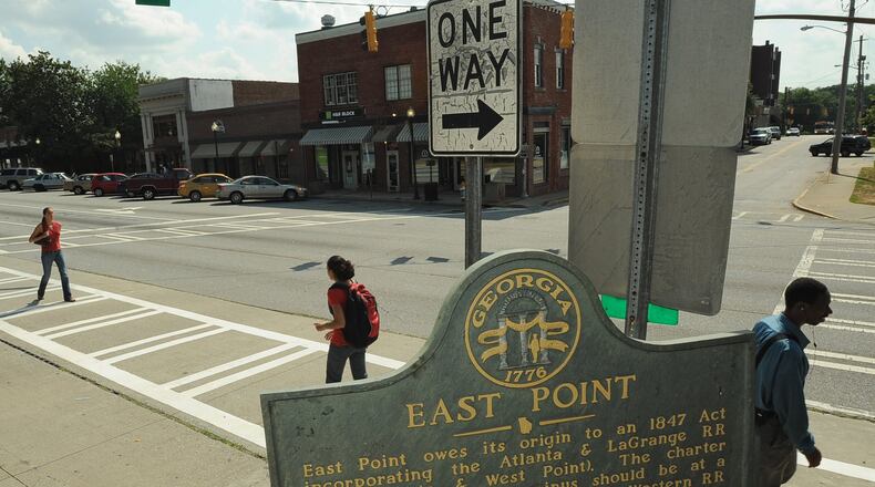 Downtown East Point, one of the southside cities planners think could benefit from a network of trails and bike paths. Hyosub Shin / hshin@ajc.com