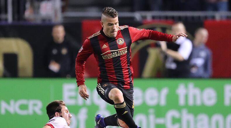 Atlanta United fullback Greg Garza makes a move past N.Y. Red Bulls defender Alex Muyl during the first half of their first game in franchise history on Sunday, March 5, 2017, in Atlanta. Curtis Compton/ccompton@ajc.com