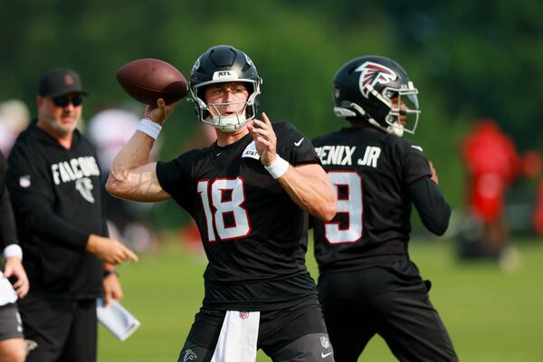 Four years ago, quarterback Jack Strand thought he’d be preparing for graduate school, eyeing a career at NASA. Now he’s focused on his newest ambition: piloting the Falcons’ offense this preseason. (Jason Getz/AJC)