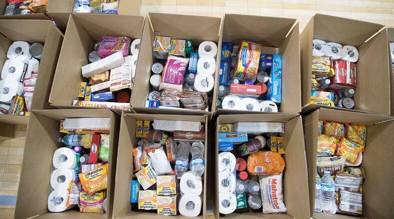 Clayton County Schools extends partnership with Atlanta Community Food Bank. (ALYSSA POINTER / ALYSSA.POINTER@AJC.COM)