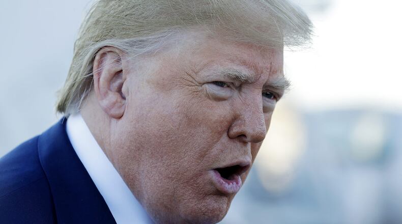 President Donald Trump talks to reporters before boarding Air Force One for a trip to Chicago to attend the International Association of Chiefs of Police Annual Conference and Exposition, Monday, Oct. 28, 2019, in Andrews Air Force Base, Md.