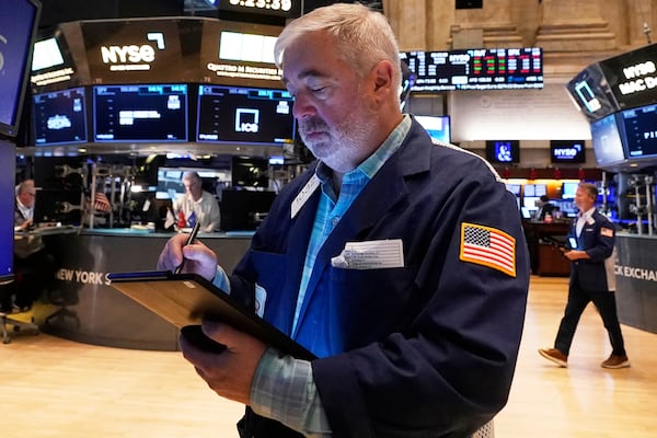Edward McCarthy works on the floor of the New York Stock Exchange, Tuesday, April 29, 2025. (AP Photo/Richard Drew)