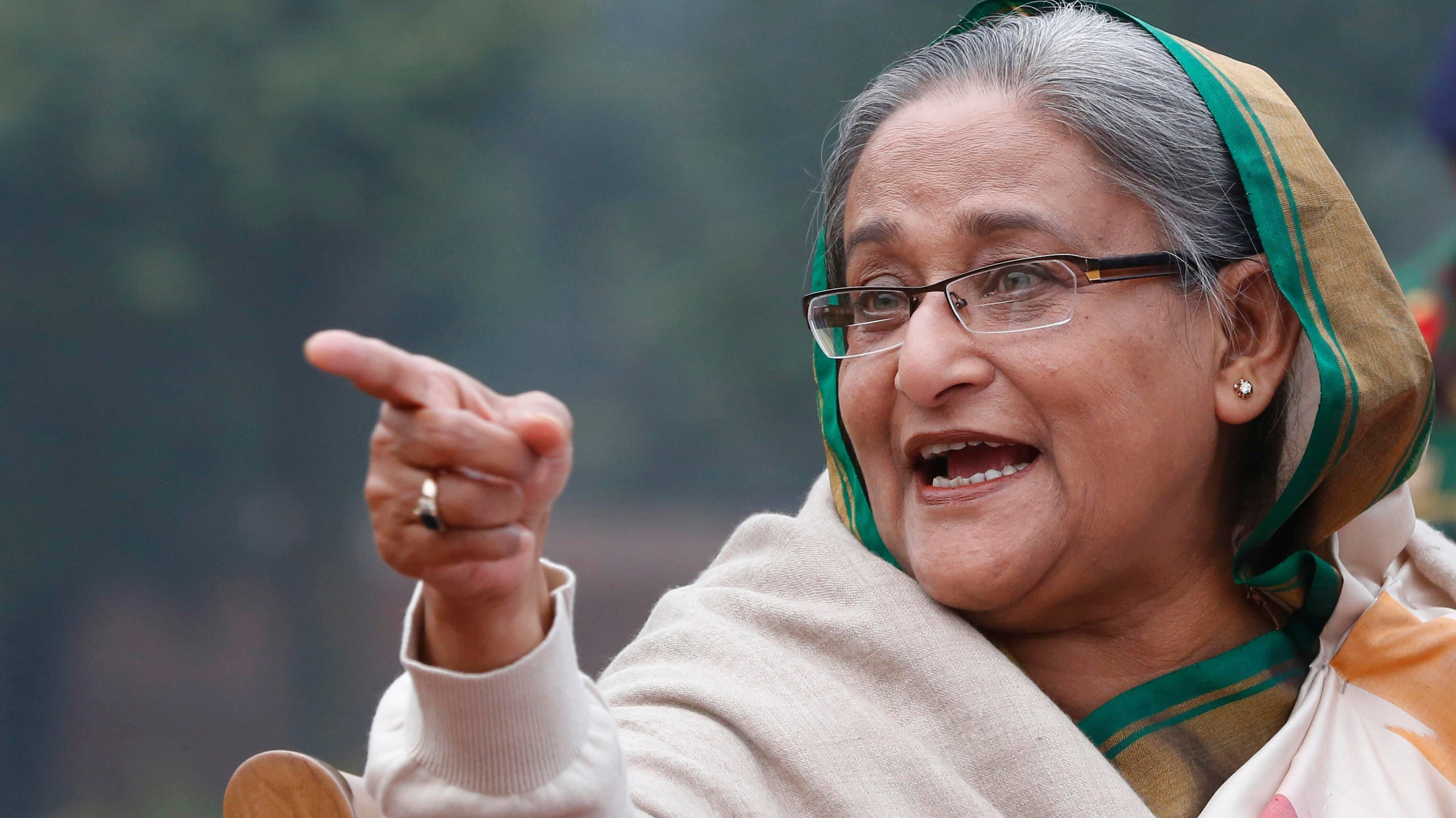 FILE- Bangladesh's Prime Minister Sheikh Hasina speaks during a press conference in Dhaka, Bangladesh, on Jan. 6, 2014. (AP Photo/Rajesh Kumar Singh, File)