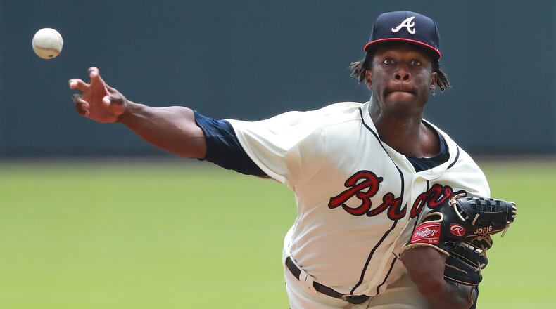 Atlanta Braves’ Touki Toussaint, making his MLB Debut, delivers a pitch against the Miami Marlins during the first inning in a MLB baseball game on Monday, August 13, 2018, in Atlanta. Toussaint went six innings while giving up 1 run on two hits with four strike outs.   Curtis Compton/ccompton@ajc.com