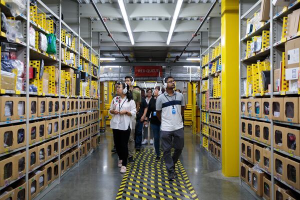 Guests get to see how the fulfillment process works at Amazon facilities first-hand on tours. (Handout)