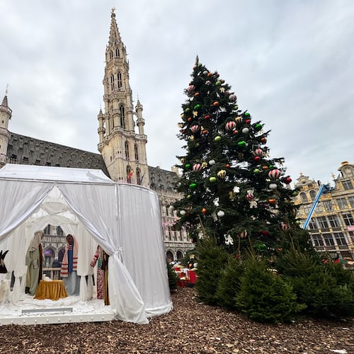A Nativity scene containing characters with cloth faces, by Belgian artist Victoria-Maria Geyer, is displayed in a white tent in Brussels, Monday, Dec. 1, 2025. (AP Photo/Sylvain Plazy)