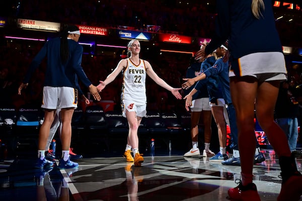 Indiana Fever's Caitlin Clark (22) is introduced before a WNBA basketball game against Golden State Valkyries, Wednesday, July 9, 2025, in Indianapolis. (AP Photo/Doug McSchooler)