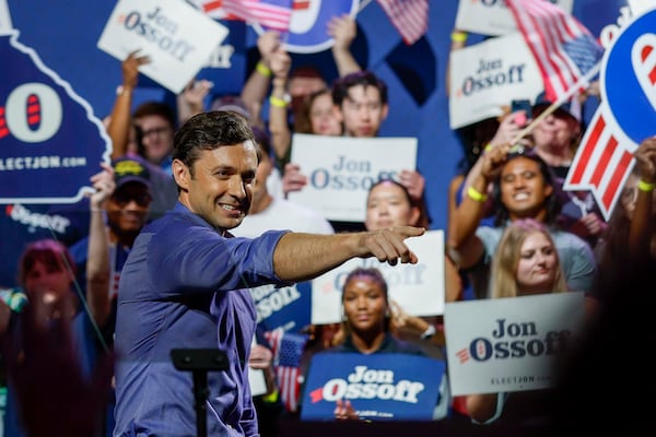 U.S. Sen. Jon Ossoff points to the crowd after delivering a speech at a campaign rally in Atlanta earlier this month. (Miguel Martinez/AJC)