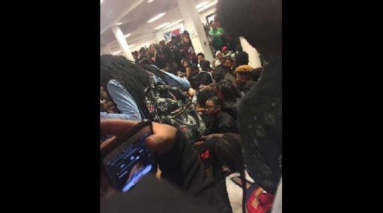 Students stage a sit-in at North Springs Charter High School on Sept. 23. (AJC FILE PHOTO)