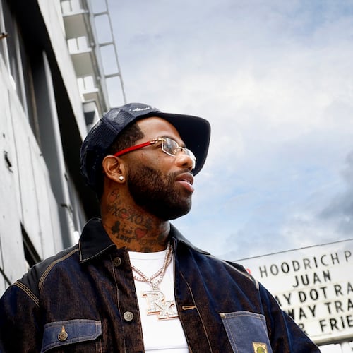 Atlanta rapper Hoodrich Pablo Juan poses Saturday, Nov. 29, 2025, outside of Center Stage before his first performance since his recent release from prison. (Akili-Casundria Ramsess, EyeAkili Media for The Atlanta Journal-Constitution)