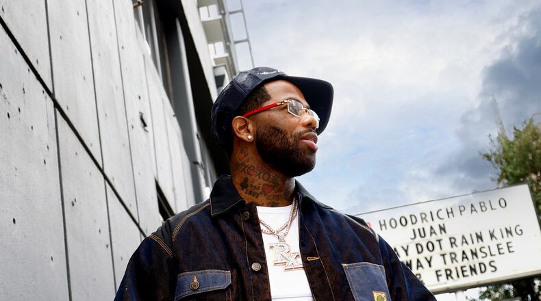 Atlanta rapper Hoodrich Pablo Juan poses Saturday, Nov. 29, 2025, outside of Center Stage before his first performance since his recent release from prison. (Akili-Casundria Ramsess, EyeAkili Media for The Atlanta Journal-Constitution)