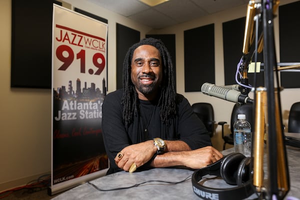 WCLK entertainment writer and personality Ray Cornelius broadcasts from inside their station on the lower level of the Woodruff Library on Clark Atlanta University’s campus. (Jason Getz/AJC 2024)