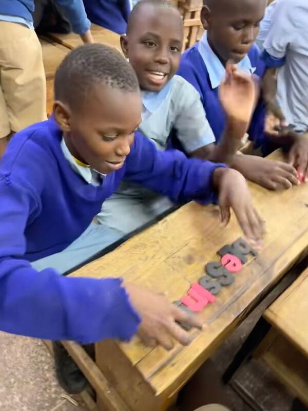 Kenyan students were eager to learn and use the letters and other literacy resources given by KIPP teachers. (Courtesy of KIPP Atlanta Schools)