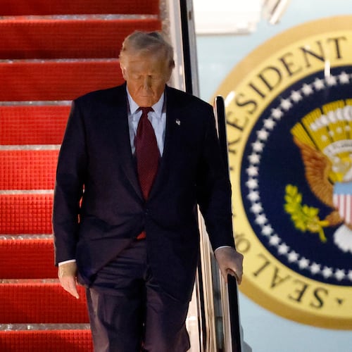 President Donald Trump walks down the stairs of Air Force One upon his arrival at Joint Base Andrews, Md., Wednesday, Nov. 5, 2025, after giving a speech at the American Business Forum in Miami. (AP Photo/Luis M. Alvarez)