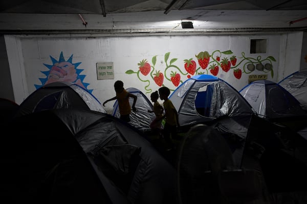 Children play in a public bomb shelter in Tel Aviv, Israel, on Saturday, June 21, 2025, amid concerns over potential Iranian missile attacks. (AP Photo/Oded Balilty)