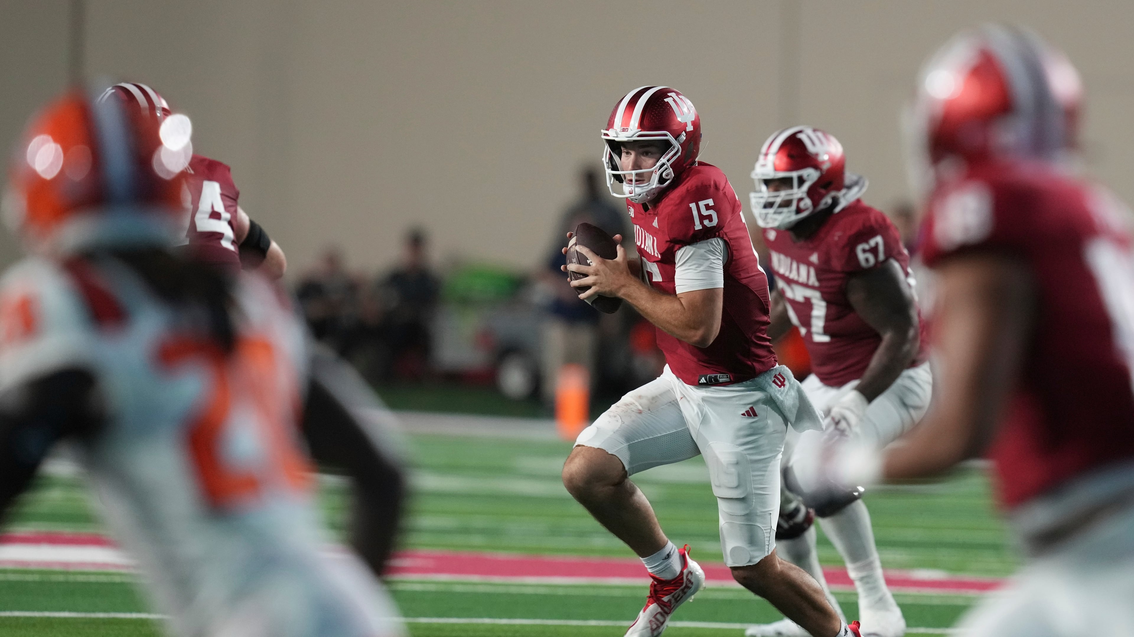 Indiana quarterback Fernando Mendoza (15) runs during the second half of an NCAA college football game against Illinois, Saturday, Sept. 20, 2025, in Bloomington, Ind. (AP Photo/Darron Cummings)