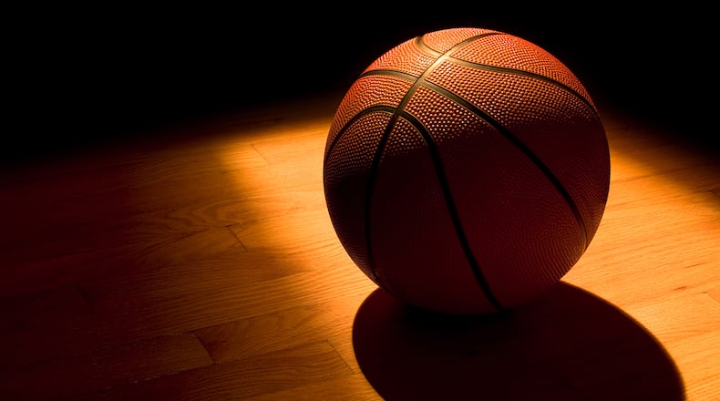 An Oklahoma broadcaster was caught on a hot mic using racial slurs directed at a high school girls' basketball team during a state tournament. (Dreamstime/TNS)