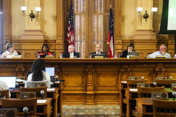 Members listen during a session as the State Election Board considers investigations of election fraud and misbehavior in Atlanta on Tuesday, July 29, 2025. (Abbey Cutrer/AJC)