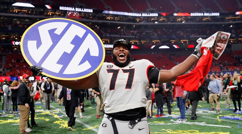 ATLANTA, GA - DECEMBER 02: Isaiah Wynn #77 of the Georgia Bulldogs celebrates beating the Auburn Tigers in the SEC Championship at Mercedes-Benz Stadium on December 2, 2017 in Atlanta, Georgia. (Photo by Kevin C. Cox/Getty Images)