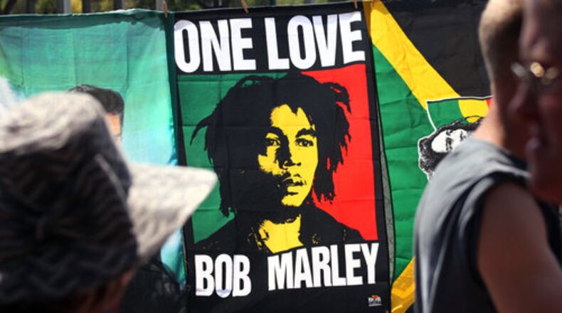 The image of Bob Marley presides over the second day of the 2011 Austin Reggae Festival at Auditorium Shores April 17, 2011.