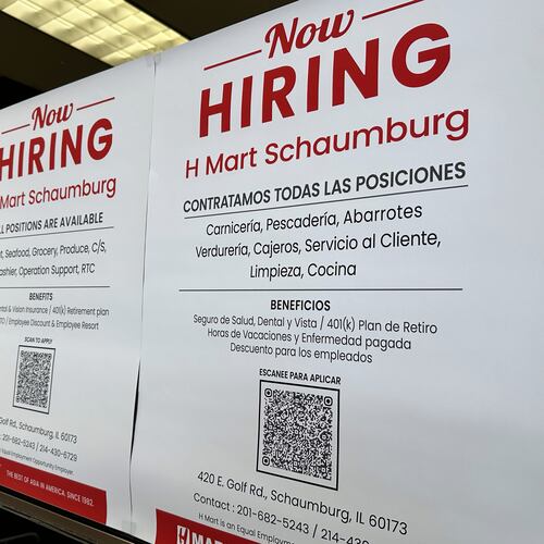FILE - Hiring sign is displayed at a grocery store in Niles, Ill., Tuesday, Dec. 30, 2025. (AP Photo/Nam Y. Huh)