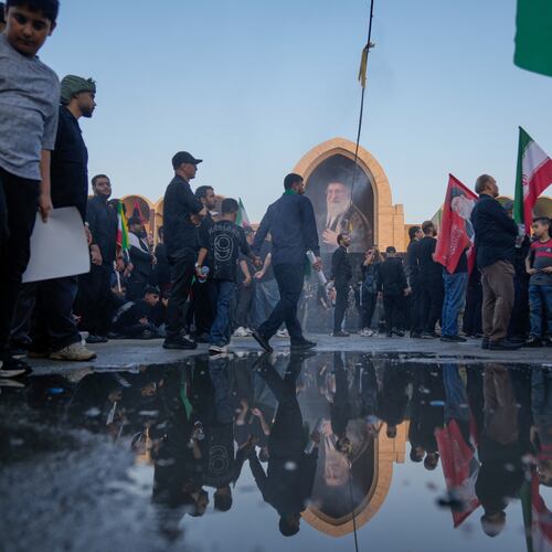 Mourners walk through the grounds of the Imam Khomeini Mosalla Grand Mosque during the funeral ceremonies for slain Iranian Supreme Leader Ayatollah Ali Khamenei and members of his family in Tehran, Iran, Saturday, July 4, 2026. (AP Photo/Altaf Qadri)