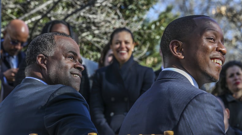 Then-Mayor Kasim Reed (left), Meria Carstarphen, superintendent of Atlanta Public Schools (center) and then-chairman of the Atlanta Public Schools (APS) Board of Education, Courtney English (right) during the press conference near the Atlanta Beltline in 2016 to announce the city and the school system had reached an agreement on how to share taxes they had been contending over. The two entities also fought over who owned school property deeds, which was resolved only after Reed left office. JOHN SPINK /JSPINK@AJC.COM