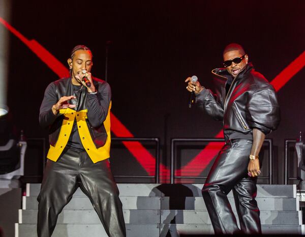 Celebrating 25 years since his major label debut, Ludacris closed out One Musicfest with countless special guests including LL Cool J, Usher, Fergie, Jadakiss, Shawna, Jeezy, Chingy, and Jermaine Dupri. Seen here with Usher performing their major hit "Yeah." Photo taken Sunday, Oct. 26, 2025 at Piedmont Park. (Ryan Fleisher for the AJC) 