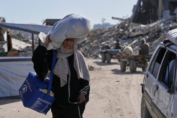 Displaced Palestinians fleeing Beit Lahia amid ongoing Israeli military operations in the Gaza Strip arrive in Jabalia, northern Gaza, on Friday, May 16, 2025. (AP Photo/Jehad Alshrafi)