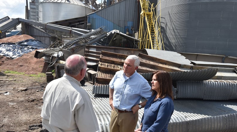 Vice President Mike Pence meets employees at Flint River Mills in Bainbridge on Oct. 16, six days after Hurricane Michael struck the area. Federal recovery funds have been approved for the region, but that only started what could be a lengthy process to get the money in the hands of farmers and others who were hammered by the storm. HYOSUB SHIN / HSHIN@AJC.COM