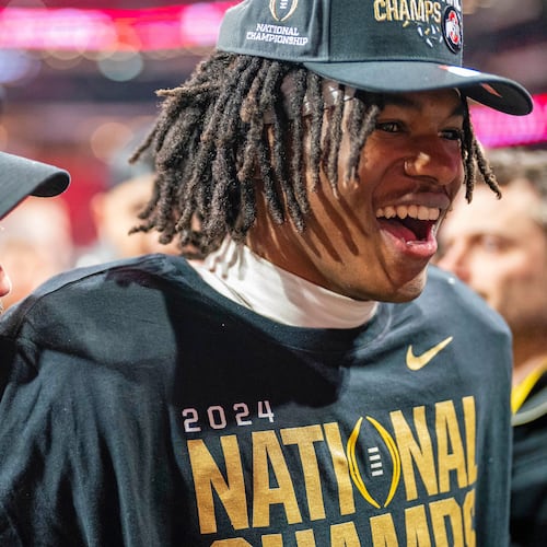 FILE - Ohio State head coach Ryan Day and Ohio State wide receiver Jeremiah Smith (4) celebrate after defeating Notre Dame during the College Football Playoff national championship game Monday, Jan. 20, 2025, in Atlanta. (AP Photo/Jacob Kupferman, File)