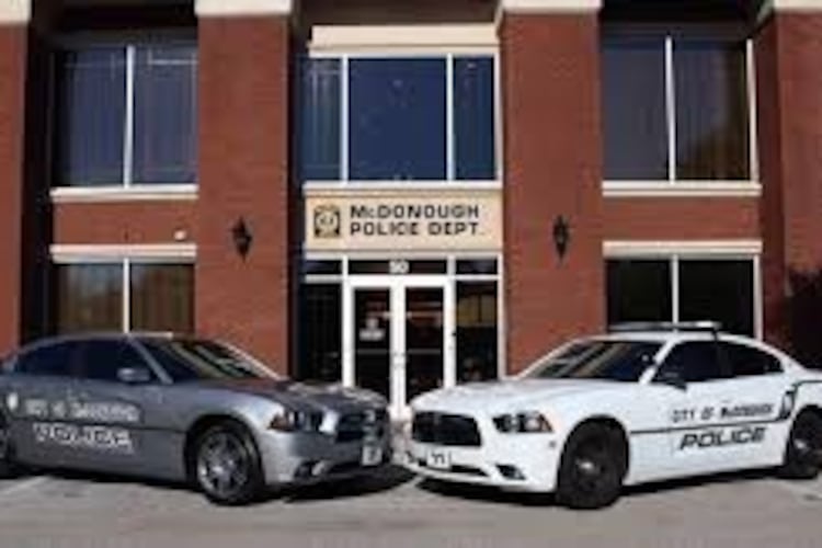 McDonough police are investigating the deaths of a Henry County laborer, a 20-year-old woman and an infant. (AJC FILE)